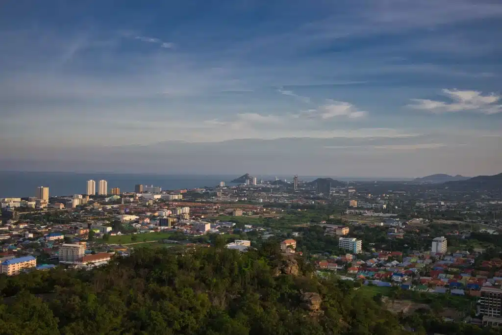 Aerial view of Hua Hin city and coastline from a hilltop