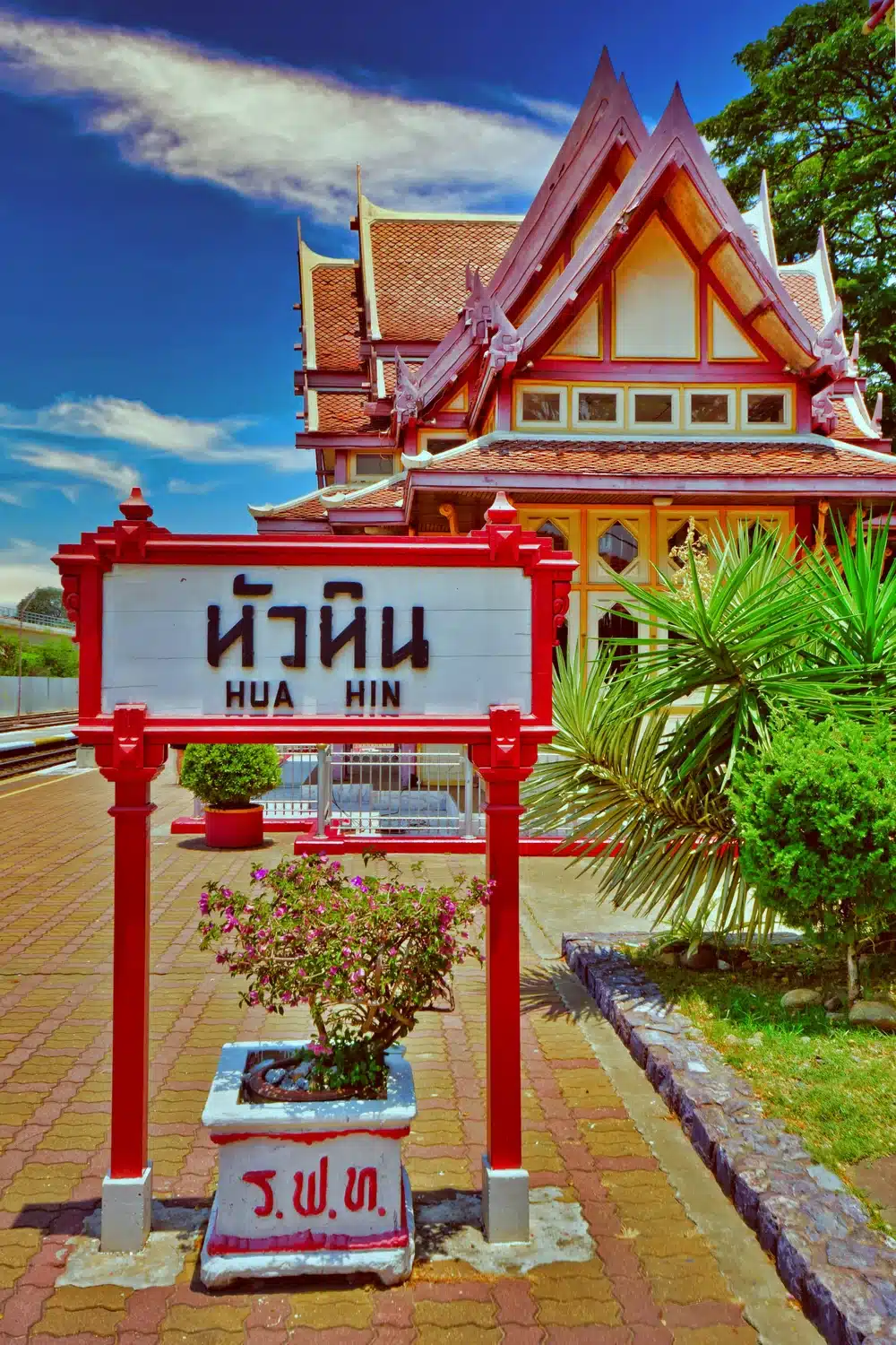 Hua Hin railway station sign with traditional Thai royal pavilion