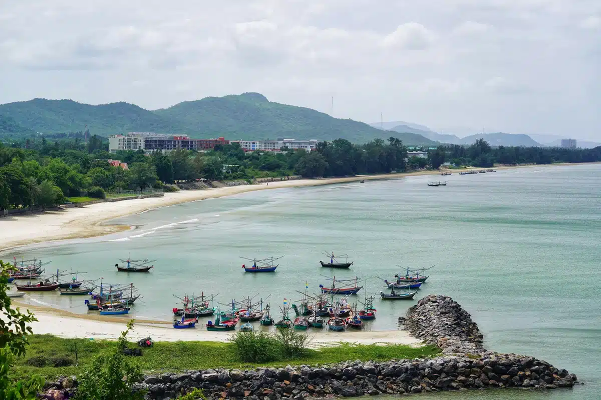 Fishing boats moored on a quiet beach near Nong Kae, Hua Hin
